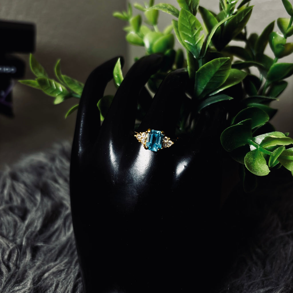 Light Blue Topaz Emerald Cut Goldtone Ring
