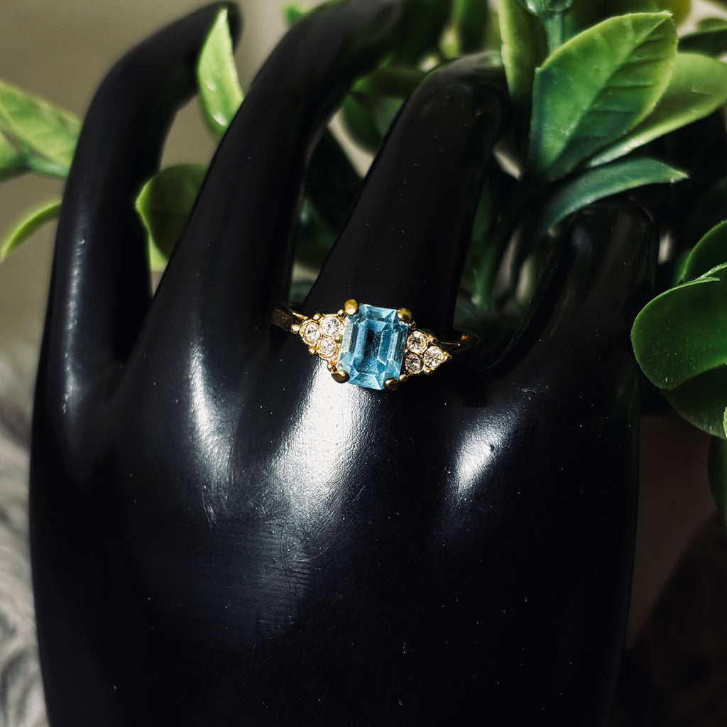 Light Blue Topaz Emerald Cut Goldtone Ring