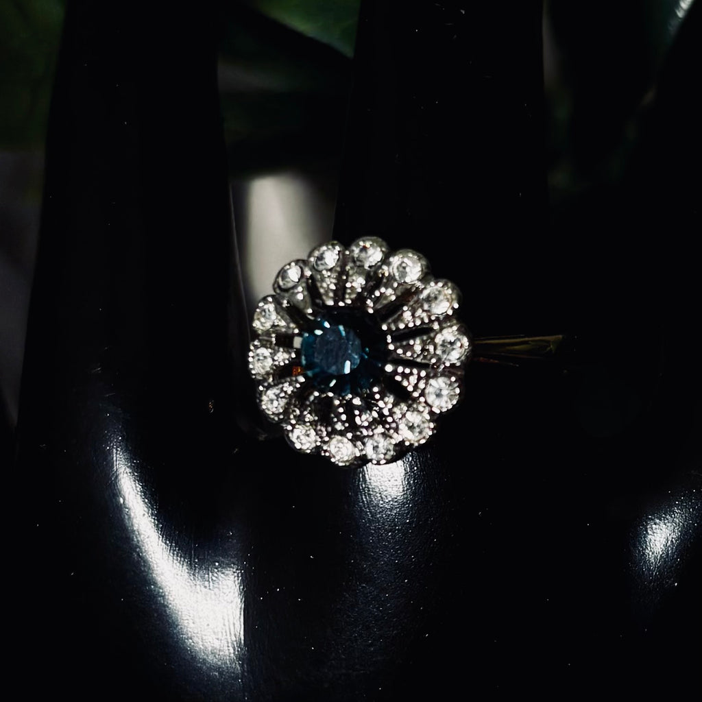 Blue Topaz Halo Goldtone Ring