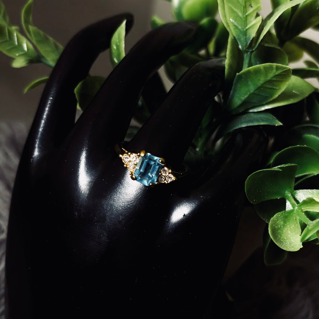 Light Blue Topaz Emerald Cut Goldtone Ring